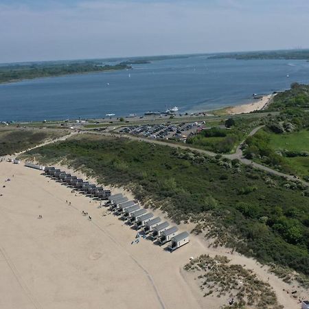 Strandbungalows Vrouwenpolder Bagian luar foto